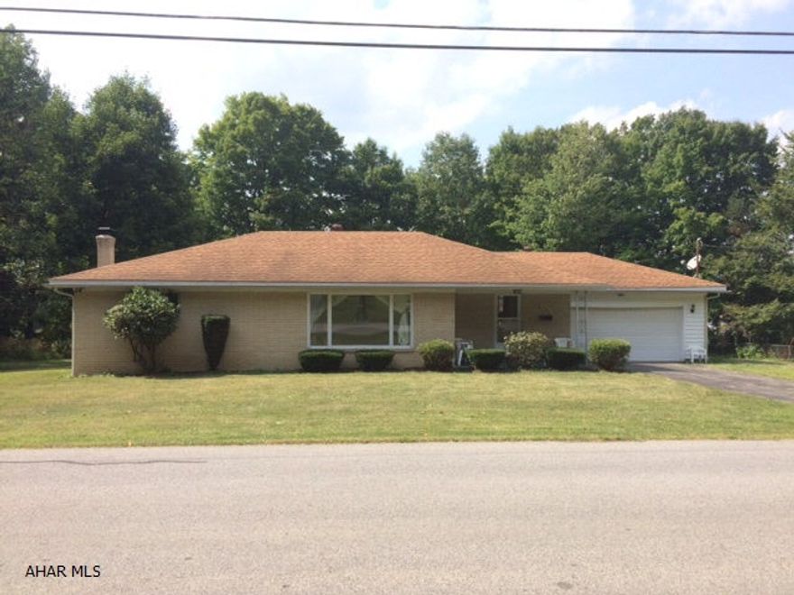 This brick ranch home sits on a beautiful large flat lot in a quiet area of Cresson.  Large updated eat in kitchen connects to the dining room, great space for entertaining family and friends.  Large garage for parking cars in winter.  Large basement with potential to finish how you want.  This brick house is much larger than it looks.  Must see.