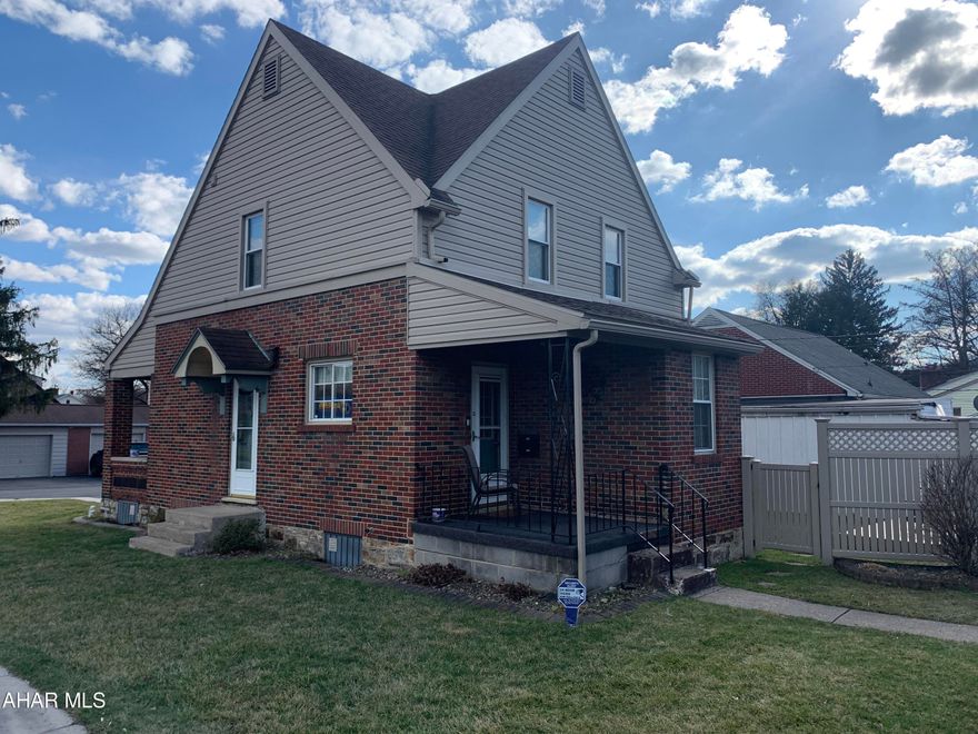 This very quaint 1931 Colonial sits conveniently  in a suburban neighborhood central to many amenities in Altoona, PA.
 1,588 sq. ft. with 3 bedroom, 2 full baths, dining room, spacious family room, clean dry usable basement, large usable attic, and updated kitchen.
windows, roof, driveways, sidewalk, siding, garage lifted, and plumbing updated 12 yrs ago
new kitchen installed 4 yrs ago
small partially enclosed back yard perfect for kids
2 separate -two car + driveways ( one private on the side, one on Union Avenue)
2 car garage with garage door opener
2 ring door bell cameras 
Appliances: refrigerator, electric stove top