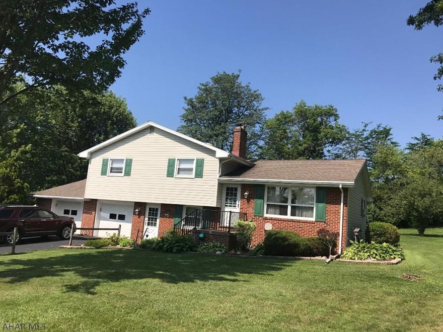 Large lot in Hollidaysburg School District. Well maintained multi level home with a two car garage. Beautiful level lot with garden area.