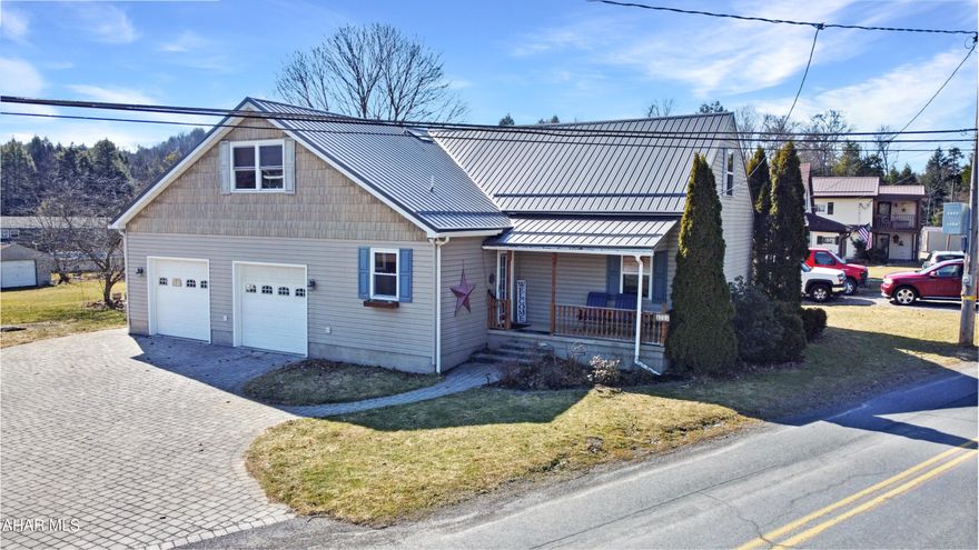 Welcome to 3235 Benshoff Hill Road, located in the Central Cambria School Districts, Jackson Township. This stunning home is deceptively spacious, offering much more room than it appears from the street. Recent updates enhance its appeal, including a brand new metal roof complete w/ a lifetime guarantee. Upon entering the main floor, you will be welcomed by a generous foyer leading to a large half bathroom w/ laundry. The layout features a cozy sitting room, a beautifully appointed kitchen w/ an island & ample cabinetry, a dining room, a formal living area, & an expansive family room w/ a propane fireplace & sliding glass doors that open to the rear patio, perfect for entertaining. Upstairs, you'll find a full bathroom, three spacious bedrooms w/ abundant closet space, & a luxurious master suite that boasts two walk-in closets & a sizable en suite bathroom. Additionally, the upper level includes a versatile bonus room that can serve as an office or a fifth bedroom. The unfinished basement provides excellent storage solutions, while the exterior is equally impressive. It features a large paver driveway, a welcoming covered front porch, an oversized heated two-car attached garage, a detached garage/shed, a picturesque paver patio w/ a gazebo, & a sprawling yard, offering endless possibilities for outdoor enjoyment. Call today!