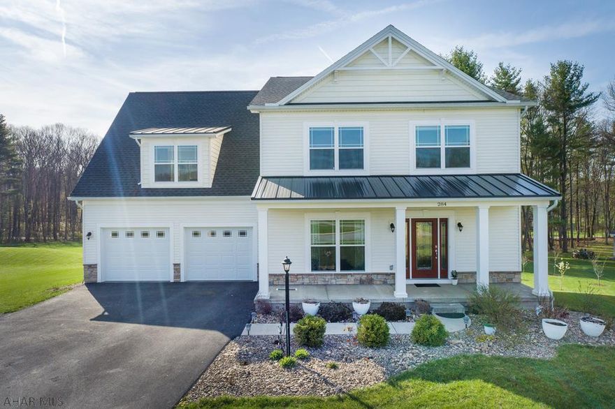 Stunning Custom Built Craftsman Style Two-story!  Perfectly positioned on 1.22 acres in the desirable Trotter Farm Estate subdivision offering eye-catching curb appeal, lovely landscaping & a welcoming covered front porch.  Interior highlights include a fresh & functional floor plan that delivers wide plank hardwood floors & lots of windows (13 additional windows added when built) filling the home with an abundance of natural light.  The open concept kitchen, family room & dining area is perfect for entertaining.  The kitchen features Granite countertops, glass tile backsplash, a large island with a breakfast bar & a walk-in pantry.  There is a HUGE laundry/mudroom & leads to the attached 2 car garage.  With 3552 finished square feet & a large yard, you have plenty of room to spread out.