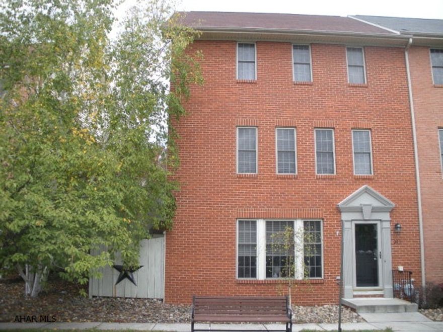 203 Sweet Cherry Court welcomes you to this over sized end unit town home, this is one of just a few 3 bedroom units in the neighborhood. Walking in to the main entrance to the large family room with hardwood floors and a gas fireplace, 1st floor laundry, 3/4 bath and lots of storage space. The main level has an open cherry kitchen w stainless appliances, breakfast bar, large dining area, living room and also 1/2 bath. The upper level offers 3 bedrooms and a full bath. The rear deck has a screened in area, nicely landscaped and a 2 car detached garage. The end unit offers a little more outdoor space with the fenced yard. Professional photos to be uploaded in a few days.