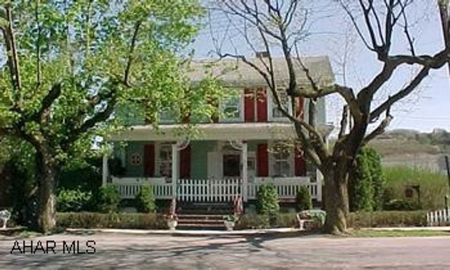 Must see! "Gingerbread House" with lots of charm.  1st floor powder room with laundry, fenced rear yard with child's club house.Above ground pool . Great neighborhood! Call Ginny Erb 695-0629.