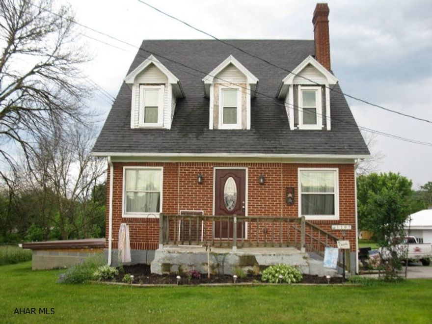 Larger than it looks 2.5 story all brick home in Hollidaysburg area school district.  3-4 bedrooms (one captive), 1 bath, with many updates.  Lots of natural light from the newer windows in this home.. updated bathroom, newer furnace and central air, water softener, new kitchen, new rear deck, extra wide stairways and much more!