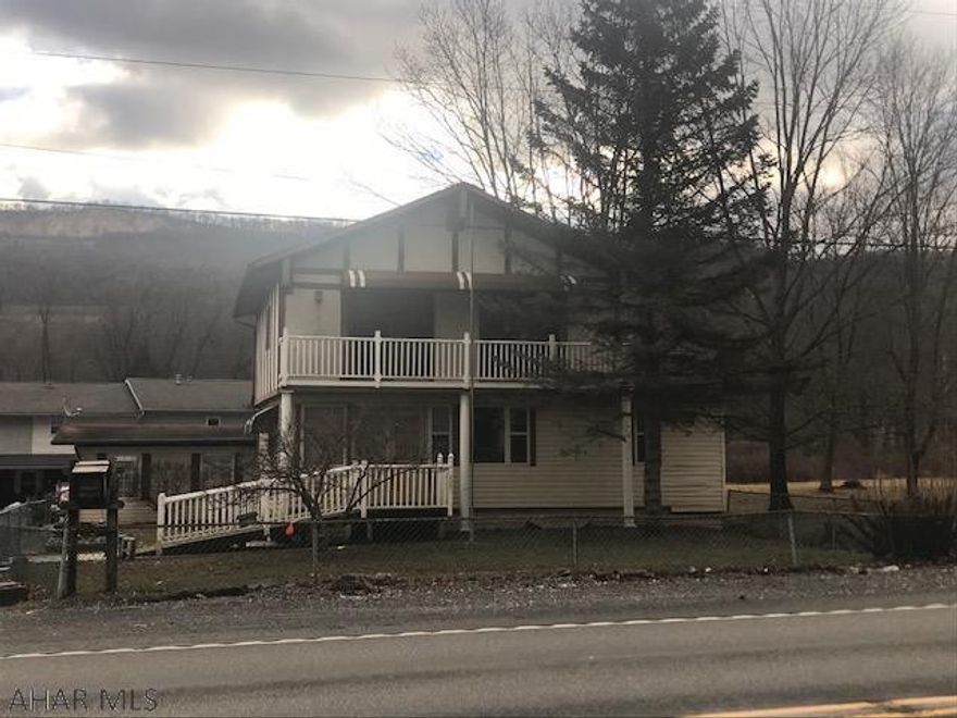 Priced for a quick sale!  Excellent investment opportunity or first time home. 4 bedrooms 2-3/4 baths. First floor master with fully handicap accessible bath. Lots of porches, a balcony and finished basement are just a few of the amenities that give this home lots of possibilities.