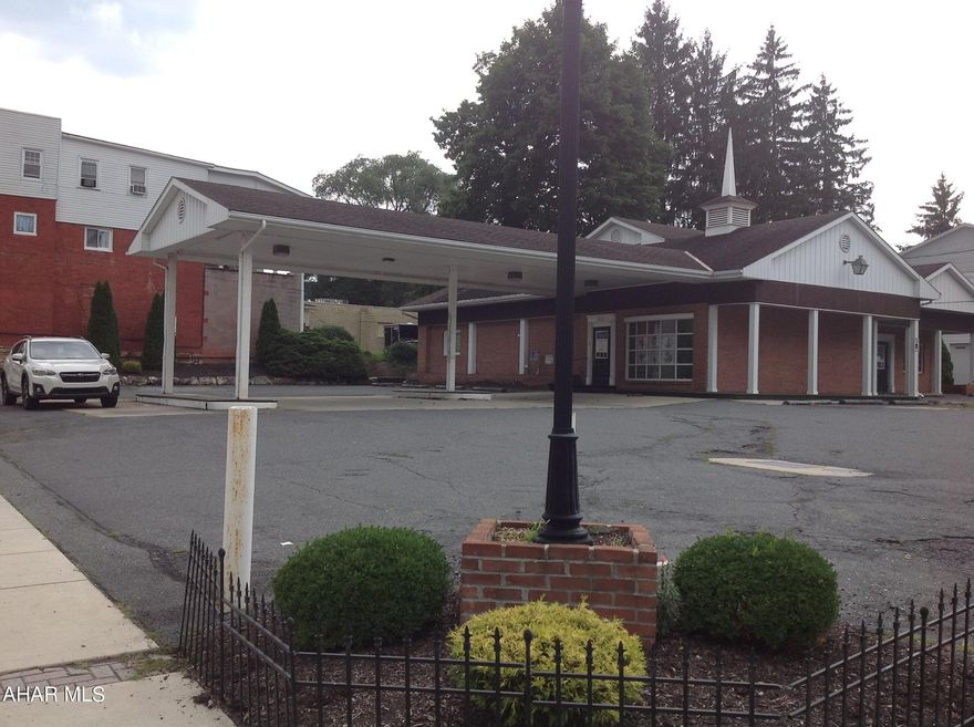 Looking for a great location with plenty of parking outside and over 2800 sqft inside - this could be your property. Was Latrents Pharmacy since 1978.