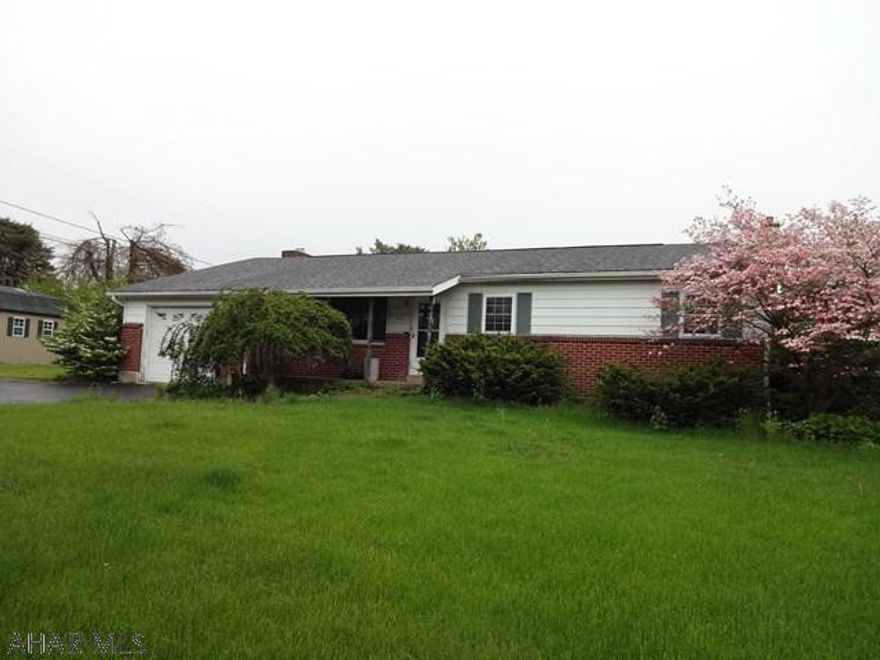 Property was built prior to 1978 and lead based paint may potentially exist. Lots of potential for this spacious one story house, hardwood floors, large dining roomd and living room, flat lot