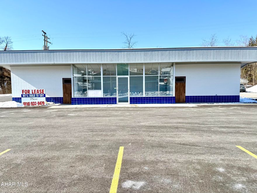 Great opportunity to bring your business vision to life in this versatile 500 sq ft commercial space! Currently set up with food service in mind, the property is already plumbed for a 3-compartment sink and includes a grease trap making it ideal for a coffee shop, sandwich or sub shop, or other small food venture. The flexible layout also works well for professional office or boutique-style retail use.

Large front windows provide exceptional natural light and excellent visibility. Located along a state road with high traffic counts, the property offers easy access for customers with convenient in-and-out entry.

Surrounded by a growing mix of neighboring businesses, the owner has helped cultivate a small business hub that's gaining momentum. Bring your ideas, creativity, and entrepreneurial spirit to be part of the movement in this up-and-coming location.