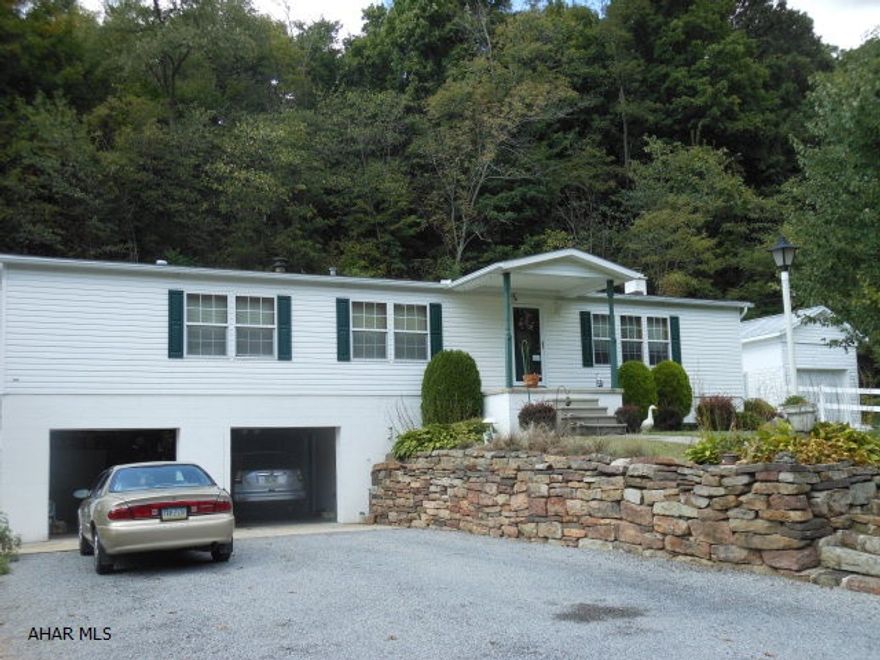 Large one story home, bright cheery interior. Eat-in kitchen, dining area, large living area and large master bedroom. Family Room in basement with full bath. Coal stoker located here. 2 car integral garage, 1 car detached garage. Economical to heat. Immaculate condition.