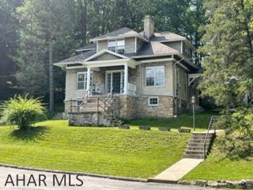 Unique stone 3BR 1.5 Bath home on 4.76 acres for sale.  Home boasts the same stone used to build the Cathedral.  Property on a dead end street where there is plenty of privacy.  5 garage stalls can store your toys.  The large detached garage has what could be an apartment above it for extra income.  Courtyard in back of house is completely private and large enough for family gatherings.  This property is a must see!!  Call listing agent with any questions and to schedule your private viewing of this awesome property.