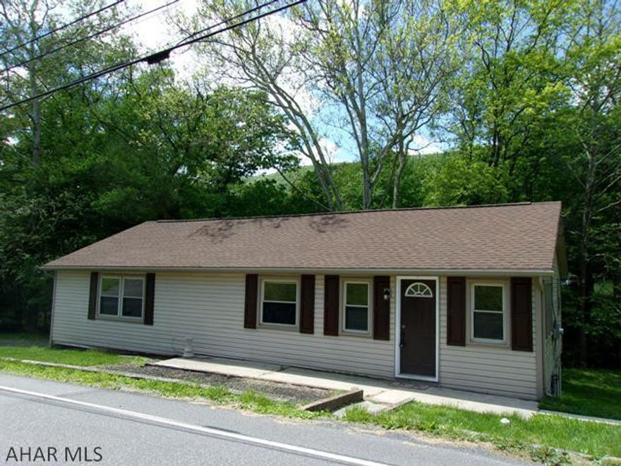 3 bdrm., 2 bath open floor plan has a renovated kitchen, dining areas and hardwood floors. 2 sources of heat- oil hot water furnace plus a wall mounted heat pump helps keep heating costs lower & provides air conditioning. Ground level walk-out basement means lots of light in the family room w/ full sized windows. Double doors access the large level yard & nearby seasonal stream which meanders thru the back of the property. Perfect backyard for BBQing, entertaining &  fun.