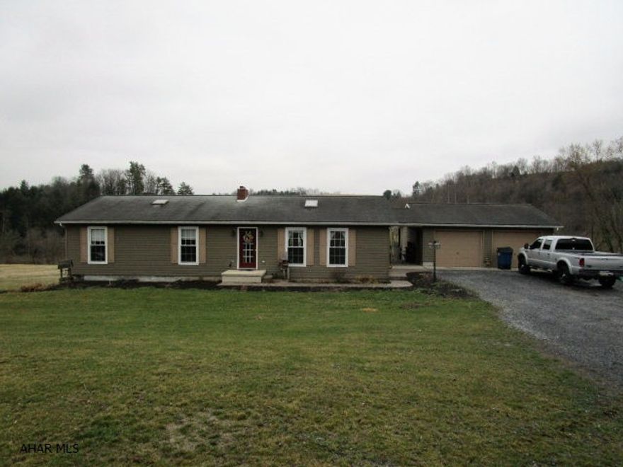Well maintained rancher resting on 9.285 acres!!  Built in 1998, this home has lots of additional features.  It offers a living room w/ gas fireplace open to the kitchen, kit w/ cer. tile floor and oak cabinets, 1st floor laundry, 2.5 baths, three bedrooms including a master bedroom with master bath and walk-in closet.  Light & airy with skylights and french doors in the kitchen and master bedroom to access the rear deck.  Full basement with partial finishing in double bonus rooms.  Two-car attached garage, one-car integral garage and detached 30' x 40' four car garage with water and electric.  20'x40' inground pool, breezeway and large rear covered porch.  The 9.285 acre site has lots of Juniata River frontage, open fields and wooded areas.  Camp, canoe, kayak or fish from your own land!!