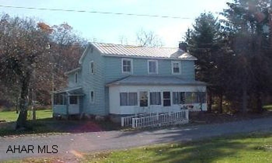 Affordable two-story vinyl sided home with a level yard and stream.  Some updates to the home include hardwood floors on the first level and a ceramic tile kitchen. Route 30 West to Route 31 at the Jean Bonnet.  Follow Route 31 to a left on Buffalo Road (at Buffalo Mills Post Office).  Make the first left on Election House Road.  Property is on the right.