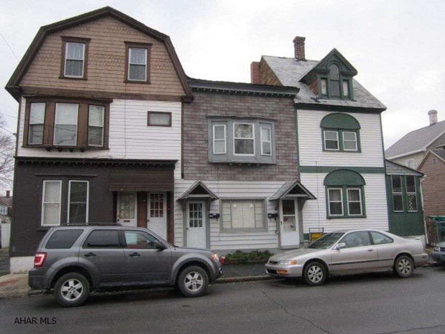 5 unit apartment building. One 2 bedroom unit, two 1 bedroom units and two 1 bedroom efficiency units. Separate heat & electric & water/sewer (511 1st & 2nd & 515)