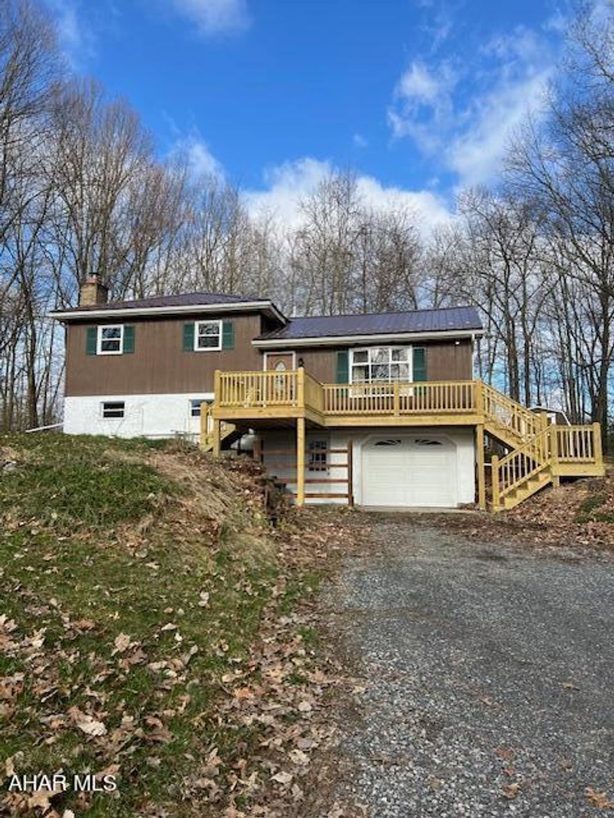 COME SEE THIS BEAUTIFULLY REDONE SPLIT LEVEL ON 1.39 ACRES IN A PRIVATE WOODED SETTING IN THE BELLWOOD SCHOOL DISTRICT.
HAVE YOUR MORNING COFFEE ON THE DECK AND LISTEN TO THE NOTHING BUT THE WILD LIFE. NEW KITCHEN CABINETS AND FLOORING THROUGHOUT. NEW ROOF AND GUTTERS INSTALLED. ALL NEW WINDOWS, 200 AMP ELECTRICAL SERVICE AND NEW PLUMBING.
LIST OF ALL UPDATES UNDER DOCUMENTS. 
THIS HOME IS A MUST SEE! IT WON'T LAST!!!  BUYER TO VERIFY TAXES. NO COMMISSION PAID ON SELLER ASSIST.