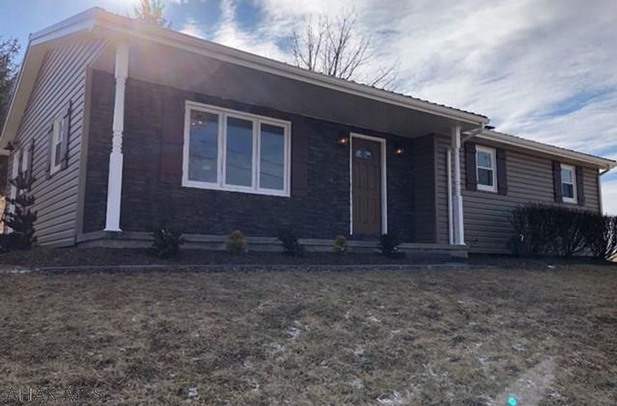 Completely renovated 3 bedroom, 2 bath ranch home located on 1+ acre. Outstanding views of the rolling countryside and Allegheny Mountain Range. Open concept kitchen, dining and living room. Kitchen has hickory cabinets, a generous island and large pantry. New roof, new siding with lovely stone front, new windows, new flooring, new fixtures, every room freshly painted and ready to move in. You will fall in love with this one!