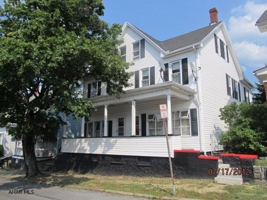 Updated double house with many new amenities. Each side has 3 large bedrooms plus a finished attic. It also has Separate utilities, meters, and they have updated wiring and plumbing. You get covered patios, off-street parking, and a fenced in yard for each side.  This Double Home WILL QUALIFY for an FHA loan as long as you are living in one side.  You can rent out the other to pay your mortgage or move in a family member to share the expenses.