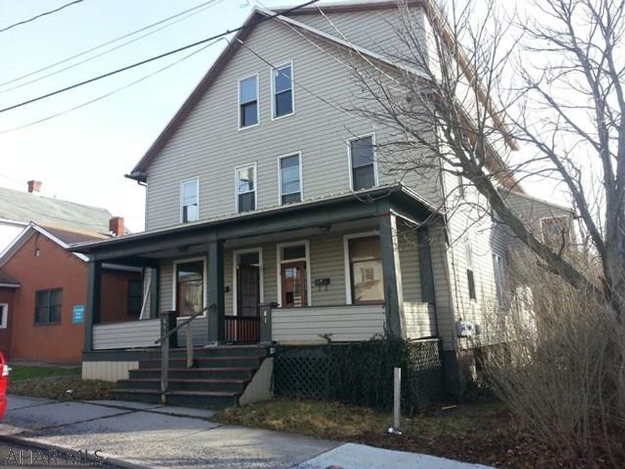 Investors or handyman special. Being sold as is. Potential for great return once fully rented. Side by side duplex, with additional apartment above 2 car garage. Private access to 3rd floor of 819 makes it possible to turn this into a 4 unit. Some freeze damage to radiators and water lines with repairs started but yet not complete. Possible use of a renovation loan if owner occupied. Call today for more information, or to schedule a tour