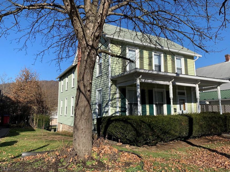 Charming starter home located within walking distance from the Bedford Historic District.  Additional blown in insulation, foam exterior insulation and new thermal windows and siding make for maximum heat efficiency.  Mutiple large windows bring in tons of natural light through this bright and airy home.  Enjoy both the side screened in porch and the covered front porch while enjoying this exceptionally large yard.