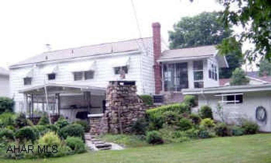 One owner. 1 story. Family room in basement - lovely landscaped yard. Sunroom off kitchen - hardwood floors under carpet on main level.