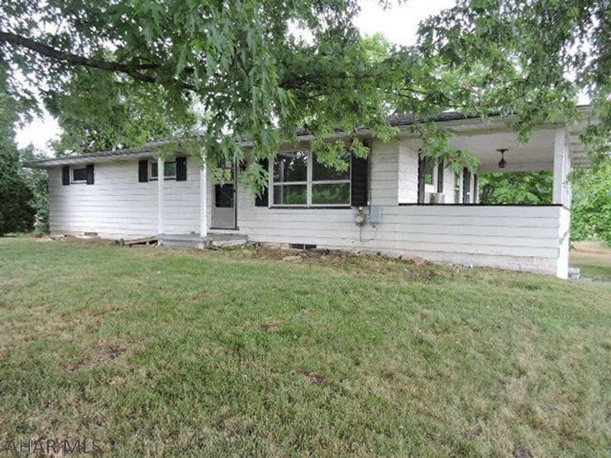 Great bones in this 1 story home.  Hardwood floors throughout and big covered porch off kitchen.  1 c integral garage.  Two parcels add up to 1.64 acres includes old pole building.  seller will not consider any offers for the first 10 days of marketing. The seller is currently in a multiple offer scenario seller has request highest and best offers be submitted before the deadline of 8/3/2020 11:59:00 PM Mountain Time.