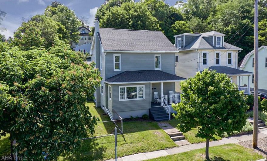 Totally updated two story home with brand new oversized 2 car garage!  This home has modern updates from top to bottom, but also has hints of its original character.  To start there is a large kitchen with included stainless steel appliances, formal dining room, living room, full bath, 1st floor laundry room / mudroom, and large foyer!  Most of the main level has ceilings that are just under 9 foot tall!  On the second floor you will find 3 bedrooms and a full bath.  There is a finished attic that could be used as a bedroom or game room.  The detached garage has lots of space for parking large vehicles and for storage. The home has a newer furnace and AC unit (installed in 2016).  All this on a large lot with fenced in side yard and back patio.