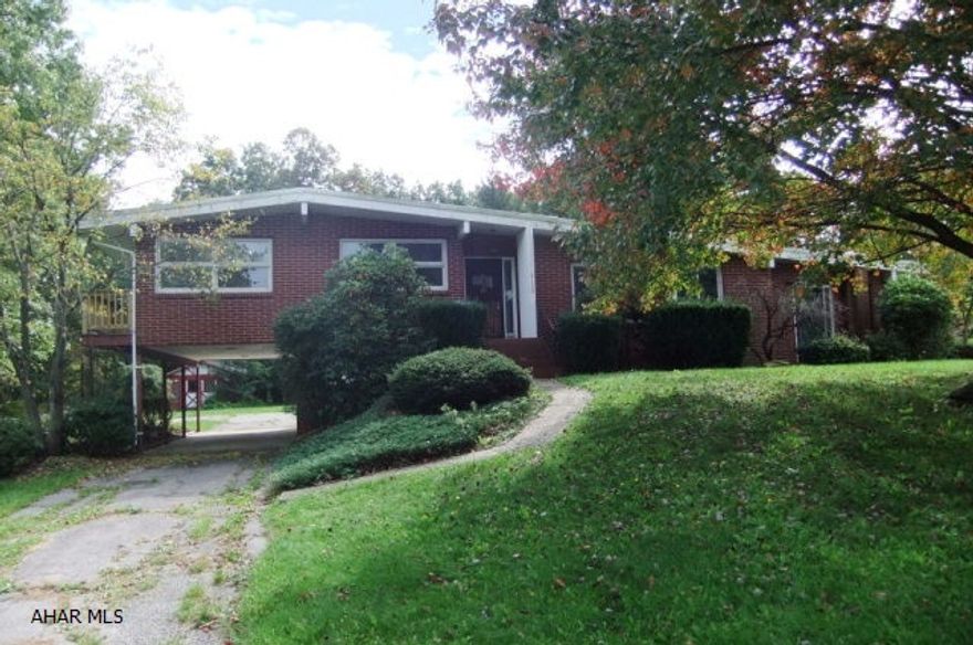 Large contemporary styled Cherry Tree home on 1 acre lot. Living room with vaulted ceiling and fireplace, eat in kitchen with dining area, large finished rec room, rear three season sun room and large concrete rear patio. One car integral garage, carport, gazebo and two large sheds. Property sold AS-IS. Seller will make no repairs. Offers must be submitted through HUD approved broker. Buyer pays both transfer taxes. Equal Housing Opportunity.