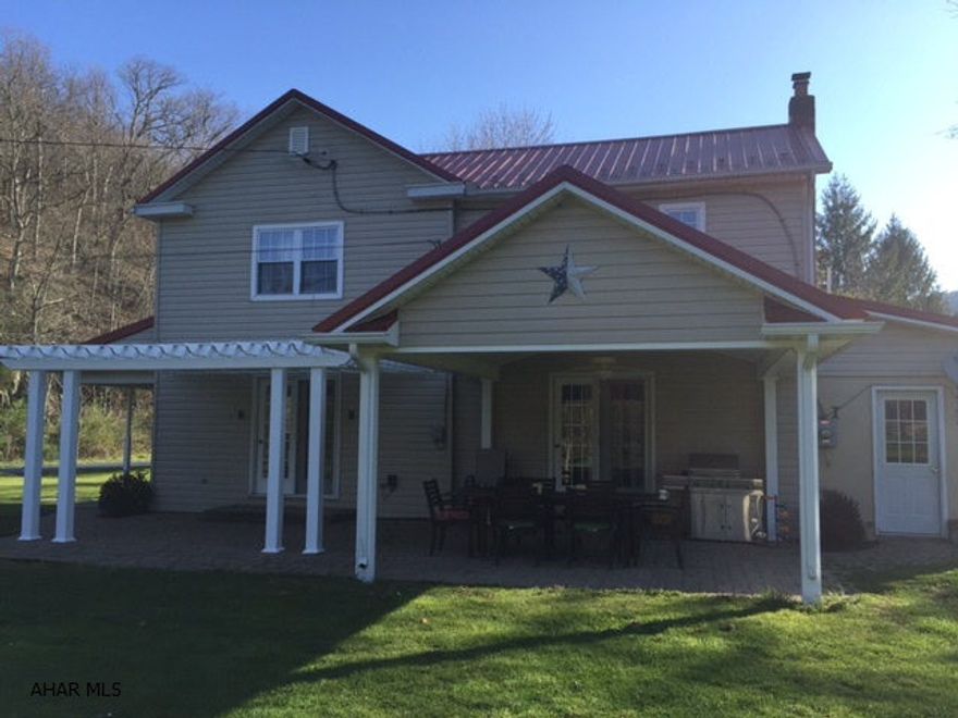 Beautiful home ready to move in to. Has very private and quiet setting . A must see with spacious rooms along with small barn and sheds . Spring fed pond with large fish . This home has been completely updated.