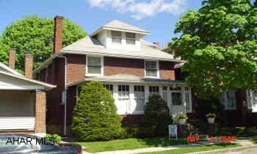 SIMPLY CHARMING - Brick home with beautiful leaded glass and original oak trim and floors. Living room with gas fireplace, first floor laundry, second floor den. Enclosed heated porch, updated wiring, concrete block garage plus carport. SIMPLY CHARMING - Brick home with beautiful leaded glass and original oak trim and floors. Living room with gas fireplace, first floor laundry, second floor den. Enclosed heated porch, updated wiring, concrete block garage plus carport. Subject to seller closing on purchase of home.