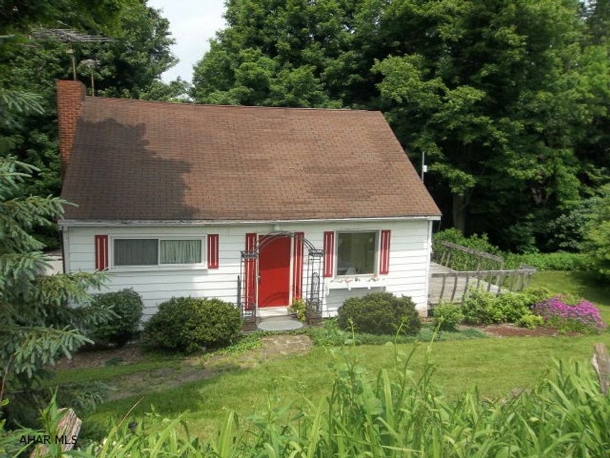 Beautiful 2 1/2 acres with a unique older home...Property adjacent to Wilmore Dam Property..  If you like nature, you will like this property...