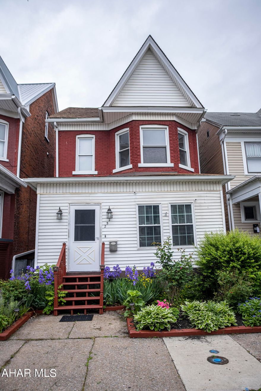 Completely remodeled 4 bed 1.5 bath Altoona beauty is ready for its next owners! This home has over 2,000 square ft of space and a beautifully landscaped yard perfect for entertaining, a detached garage, and central air! The first floor has laundry, an eat-in kitchen, peninsula bar for extra seating, a full dining room, and spacious living room. The second floor has 3 oversized bedrooms with ample closet space, including a walk-in closet in the master, and a full-sized bathroom. The third floor is completely finished with an additional bedroom and loft area perfect for an office space or game room. All appliances included: stove/oven, microwave, dishwasher, refrigerator, front-load washer and dryer, even the mini fridge under the kitchen peninsula! Come check it out!