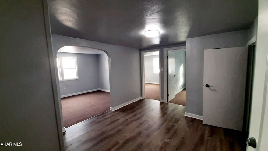 For lease, two bedroom, second floor newly renovated apartment. New kitchen and appliances, new bathroom, all new lighting throughout. Spacious living room and dining room/bonus room plus laundry hook ups. This apartment also offers off street parking and a deck for outdoor space. Landlord pays water, sewer, trash and heat. Tenant responsible for electric and internet/TV. No pets and no smoking. Security deposit required. Call for your rental application and tour of this beautiful apartment!