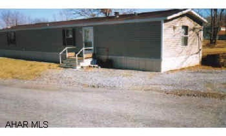 Mobile home on rented lot in Camelot woods includes shed. 14x72 bathroom skylight.  Lot rent of $200/mo.