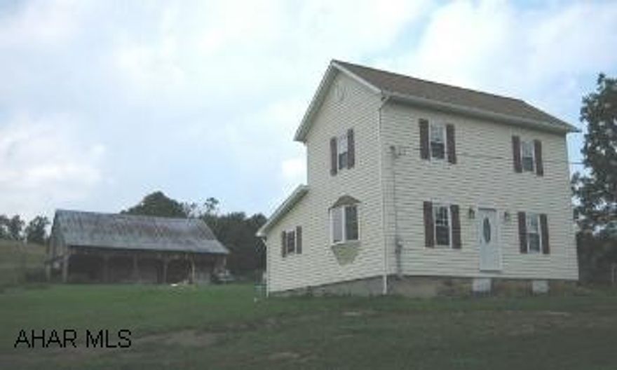 Approximately 5 acres.  Just the house with approximatley an acre is available for $128,000.00