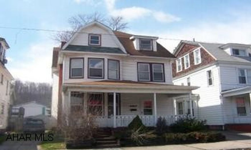 Nice 2.5 Story, large rooms, hardwood floors, beautiful oak woodwork, stair case and pocket doors.  Call Bonnie 942-2172. Nice 2.5 Story, large rooms, hardwood floors, beautiful oak woodwork, staircase and pocket doors, beautiful stain glass window, all newly remodeled, oak kitchen, 1st floor laundry and .5 bath, privacy fenced yard, deck, 4 rooms and walk in closet in attic.  Being sold As Is.  Call Bonnie 942-2172.