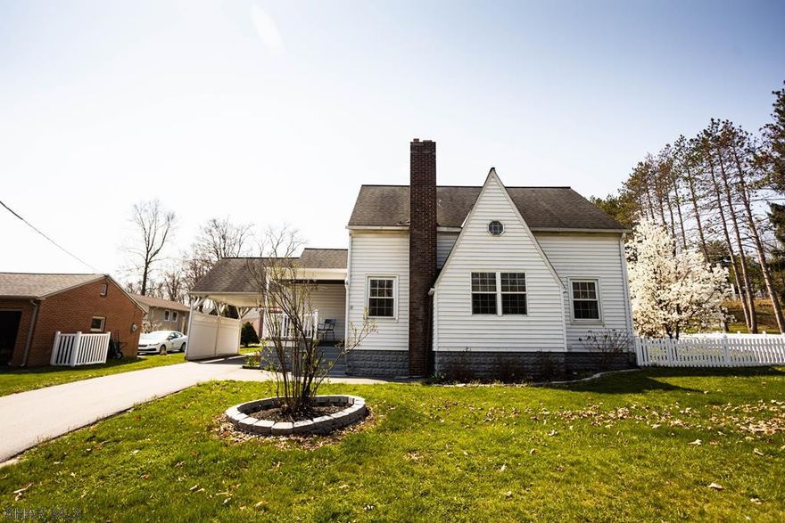 Beautiful 3 bedroom, 1.5 bath house conveniently located across from Reservoir Park. Covered front porch and covered back patio. Fenced yard. One car garage, carport, and additional off-street parking. Beautiful hardwood floors. Spacious bedrooms. Don't miss your opportunity to make this gem your new home!
