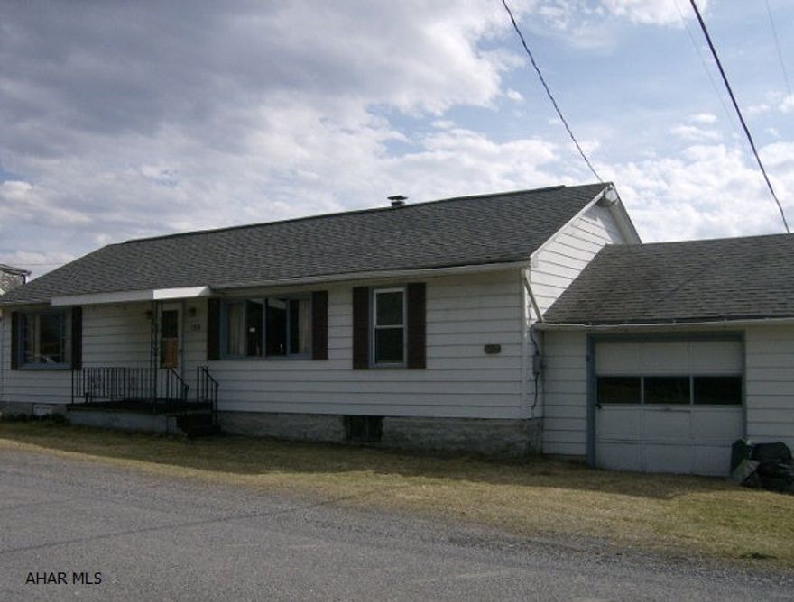 Coupon- 3 BR ranch home with a 1 car attached garage on a 80 x 200 lot. Oil FA heat.$49,900