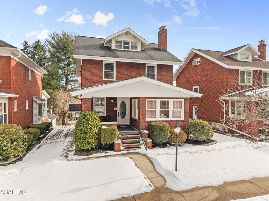 Step into timeless elegance with this beautifully maintained two-story brick home, nestled in the desirable Fairview neighborhood of Altoona, PA. Built in 1948, this classic home exudes
character and craftsmanship, featuring solid brick construction, original hardwood floors, and charming architectural details throughout.
The inviting front porch welcomes you into a spacious living room with a beautiful custom built fireplace,
perfect for relaxing evenings. A formal dining room, adorned with vintage built-ins, flows into a bright and airy kitchen with oak cabinets and newer appliances. Adjacent to the kitchen is a family room that is great for entertainment. Mini split A/C Units are located on the first floor to keep you cool in the warm months.
Upstairs, you'll find three generously sized bedrooms with ample closet space and plenty of natural light. The full bathroom retains its classic style, complemented by updated fixtures for convenience. A walk-up attic provides additional storage or a 4th bedroom.
The full basement offers a laundry area, storage, and the possibility of extra living space. Outside, a beautifully landscaped yard and the detached garage adds both convenience and charm. Located in the heart of Fairview, this home is just minutes from local parks, schools, shopping, and dining.
Interested in a showing? Let's schedule a tour today!