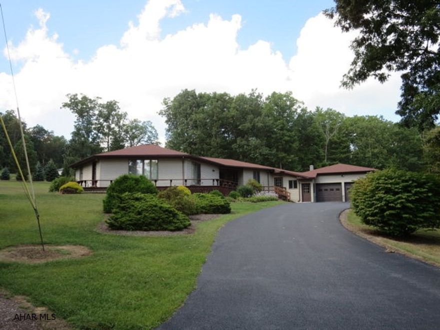 Beautiful home situated on over 10 wooded acres in a very quiet neighborhood. Features oil heat, gas fireplace, newer roof and central air. Attached heated garage includes large workshop. Abundant wildlife and wooded lot make this a delight for those who enjoy the outdoors. All this only minutes from Downtown Bedford.