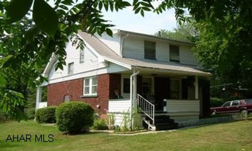 Brick & Aluminum 2 story. Location, Location,  terrific quiet & peaceful neighborhood.  Lots combined 125x120.  Highland Park area.  Dont miss this one, priced to sell quickly.  Call Hank