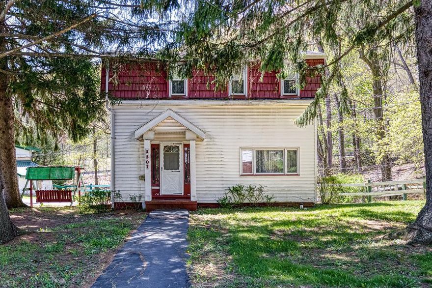 Unique property with varied usage.  Seller raised chickens, pigs, goat and horses.  Small barn behind home and large garage with 2 floors and roof line storage.  Home has first floor full bath and 2nd floor 2 bedrooms.  2.45 acres - horses used for grazing.