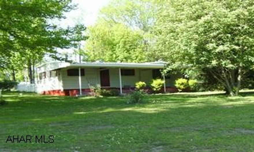 Beautfiul corner lot with nice Trees and Shrubs, Great Garage, Older Mobile Home extra lot 51-09-200 50x150 included