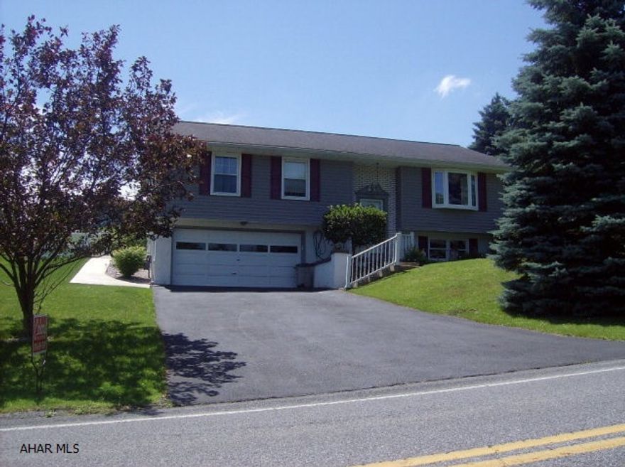 Attractive three bedroom home in a wonderful neighborhood and convenient location.  Added addition off the kitchen which leads to a private fenced in yard.  Updated kitchen and baths with neutral colors throughout.  New windows on the main floor, central air and finished family room in basement.  A must see!!!