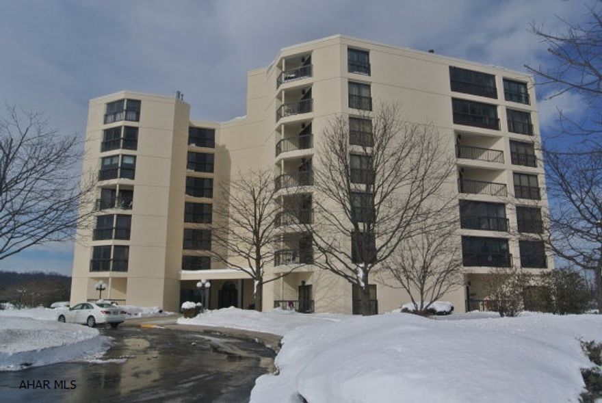 Freshly painted interior, new carpeting throughout. Nice view of Park Hills Golf Course. Secure garage parking for 1 car. Secure storage area in lower level. Beautiful party room available for parties or family get togethers. Monthly fee includes exterior and common maintenance, water, sewer and trash removal.  Exterior of building was recently painted and a new roof was installed a short time ago.