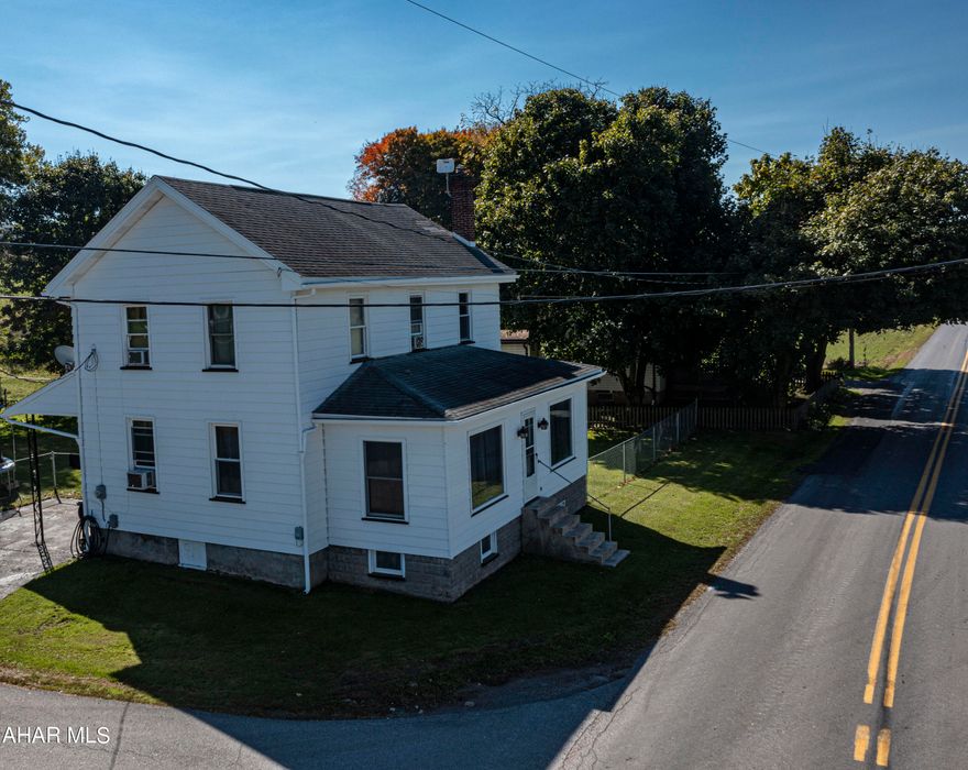 Welcome to this Two story home in the Williamsburg School District. This home features a large eat in kitchen ,a large living room, an enclosed heated front porch and a 3/4 bath on the main level. Upstairs features 3 spacious bedrooms and a full bath with an extra bonus room. Outside a large yard with a partial fence in the back yard and  a 2 car garage.  This is a must see. Schedule your tour today.