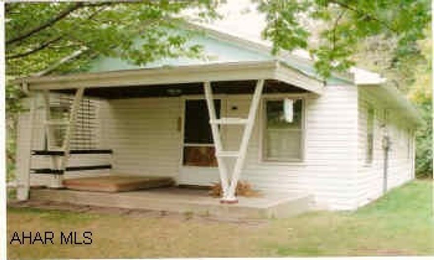 Rancher with 3BR/2Ba set on 4 acres. 2nd new septic on lot, 2 wells and 1 hand dug well.