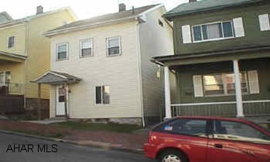 Newer  vinyl siding, shingled roof and windows.  Needs work inside.  SOLD AS IS WHERE IS.