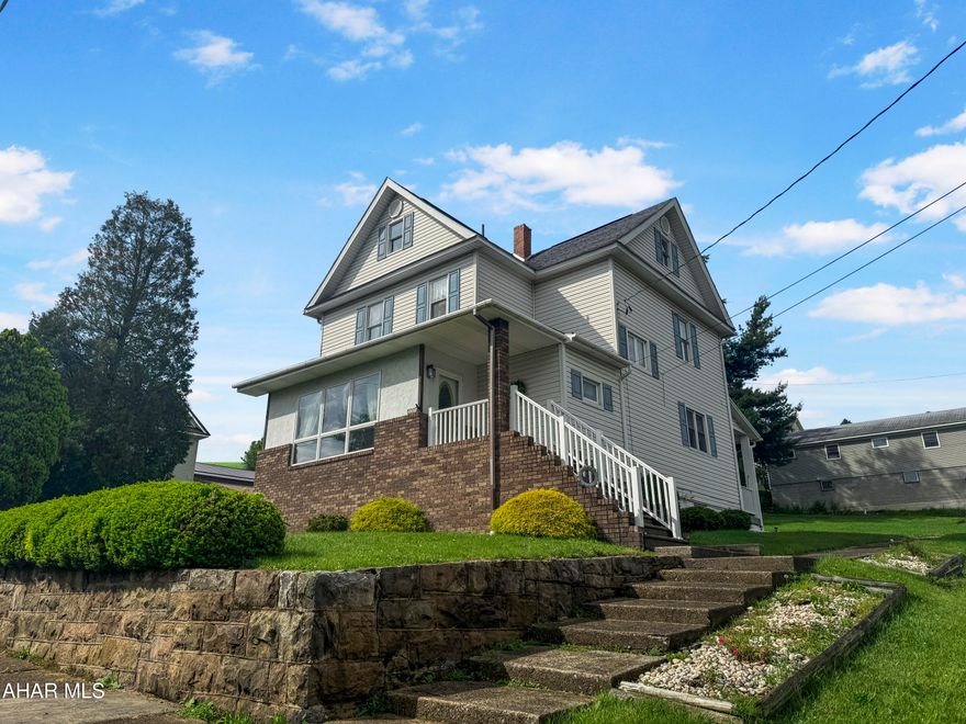 Welcome to 2301 Crawford Avenue in the charming Northern Cambria Borough. This impressive home is nestled on a spacious corner lot, showcasing an array of generous features throughout. As you enter the main floor, you'll find a bright, heated sunporch that invites you to relax & unwind. The expansive living room boasts stunning hardwood floors, providing a warm & inviting atmosphere. A large eat-in kitchen, complete w/ an adjacent pantry, offers both functionality & ample space. Additionally, a convenient 3/4 bathroom is located on this level. Venturing to the second floor, you'll discover three generously sized bedrooms, each adorned w/ beautiful hardwood floors, as well as another 3/4 bathroom for added convenience. The attic & basement remain unfinished, presenting incredible potential for your creative vision. Don't overlook the upgraded features, including a newer furnace & hot water tank. The exterior of the home is equally appealing, set on a private corner lot that includes a detached two-car garage & two covered porches, perfect for relaxation. This home is truly a gem with so much to offer. Call today to schedule your private tour!