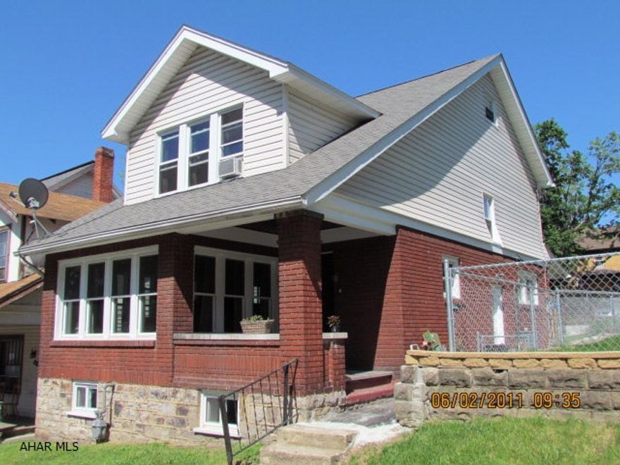 Quality throughout- slate covered front porch, solid mahogany front door, brick and vinyl siding, all thermo pane windows, oak floors on first floor, custom solid cherry kitchen with corian countertop, slate floor and back splash, updated bathroom with marble flooring and ceramic tub surround, lots of closet/storage space, wood floors on 2nd floor, finished and heated attic could be a 4th bedroom or a great man cave, nice basement, large deck, fenced in yard, room for 2 cars to park, gas budget amount is $69/month