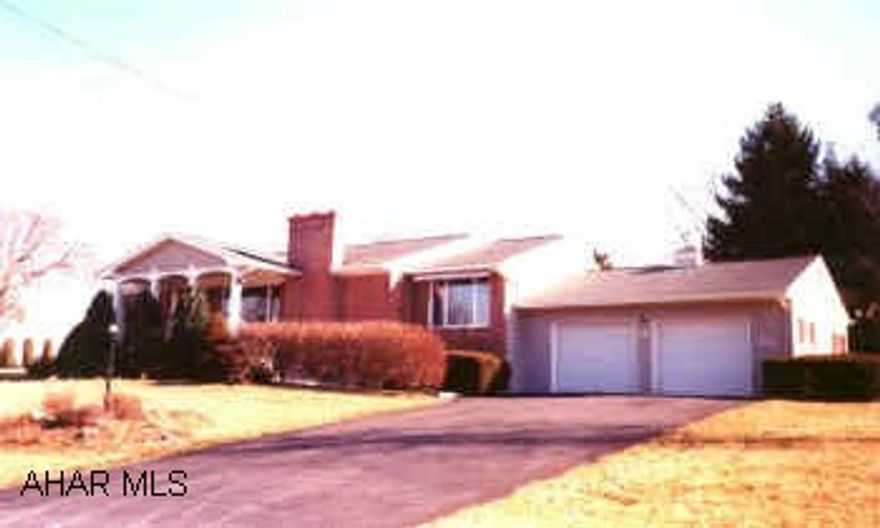 FIRST FLOOR FAMILY ROOM PLUS FLORIDA ROOM. NICE LEVEL LOT. LIVING ROOM WITH FIREPLACE.